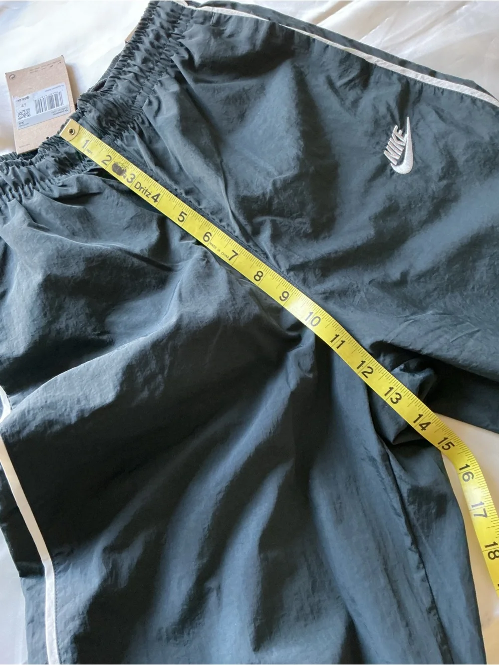 Nike women’s black track pants athletic windbreaker white stripe XS
